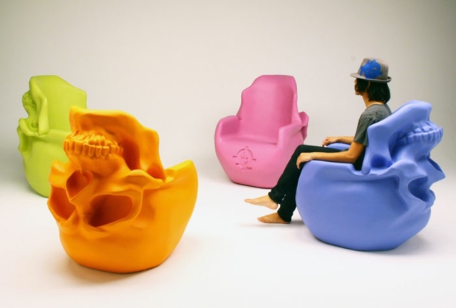 The design armchair shaped skull and neon colors interior design furniture