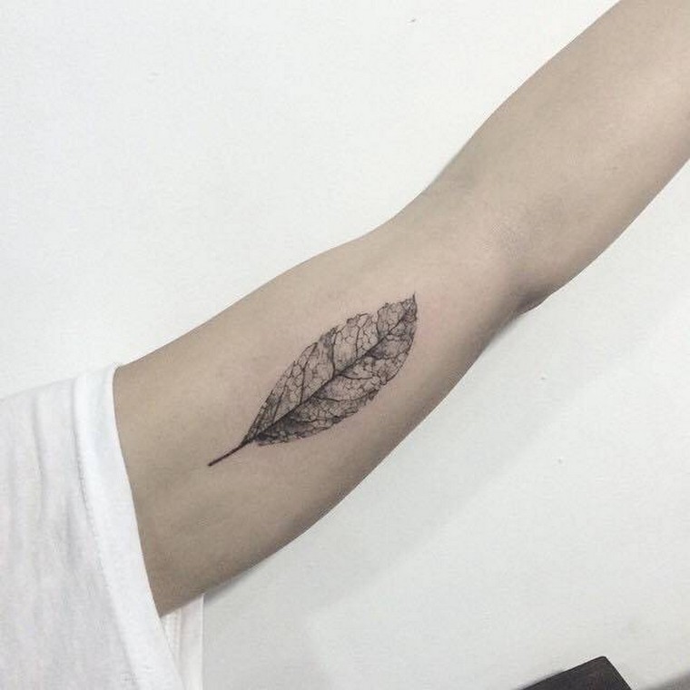 sheet-tattoo-woman forearm