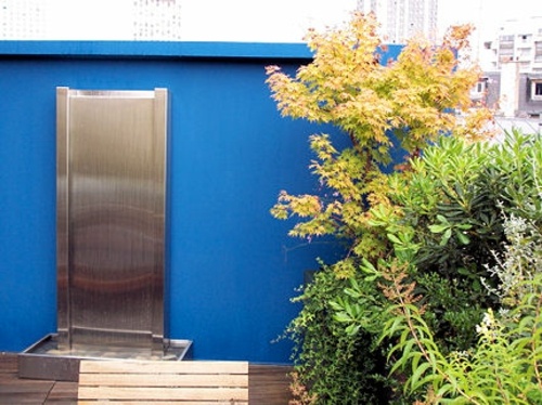 fountain balcony apartment paris xeme plants blue yellow