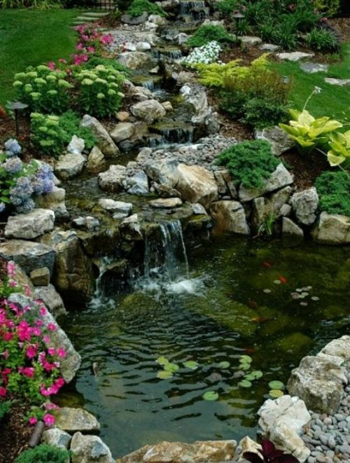 fountain garden flower vegetation lake stone