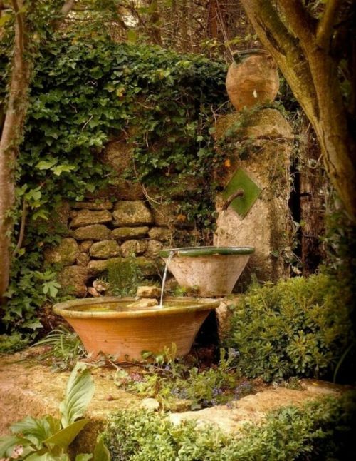 fountain garden wall old earthenware bucket