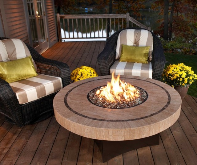 outdoor fireplace edge circle tile armchair