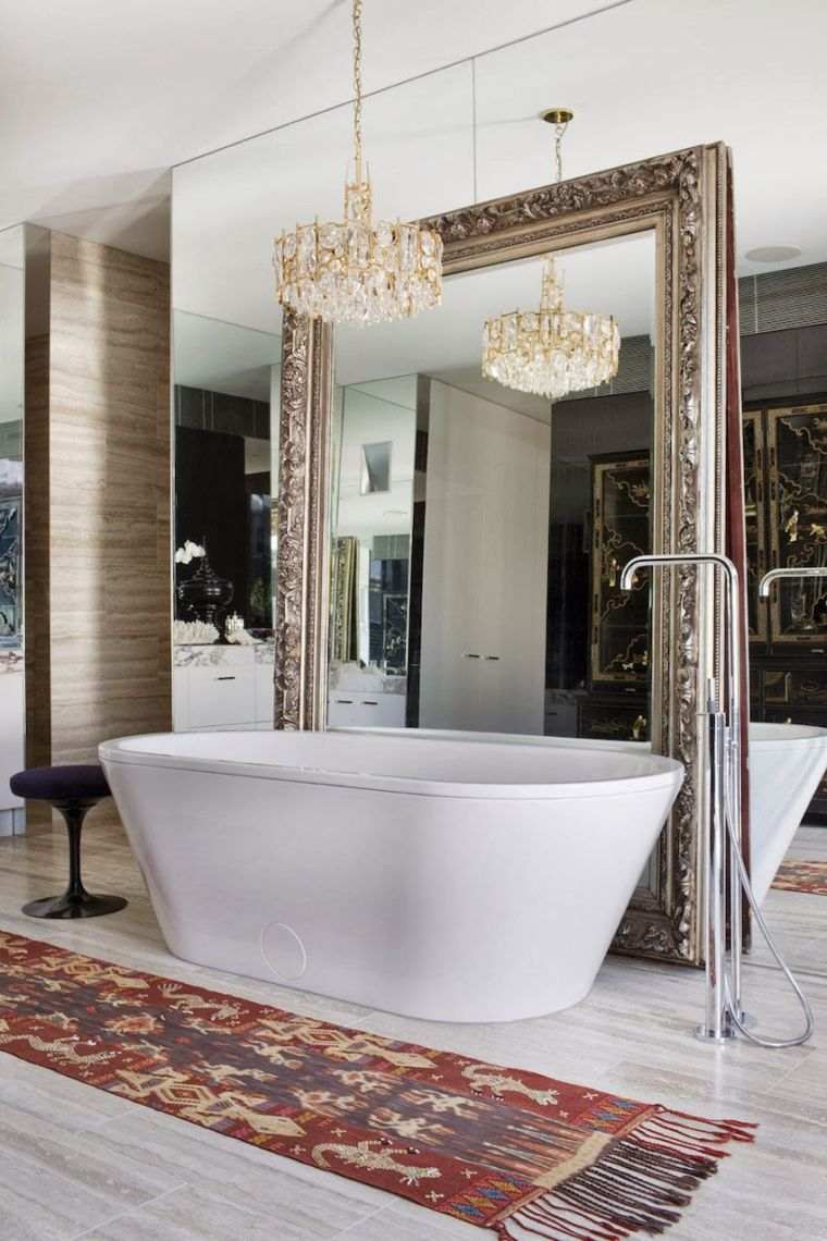 large golden mirror frame baroque decoration bathroom bathtub on foot