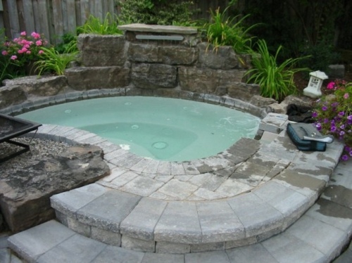 Jacuzzi azure water outside rounded edge