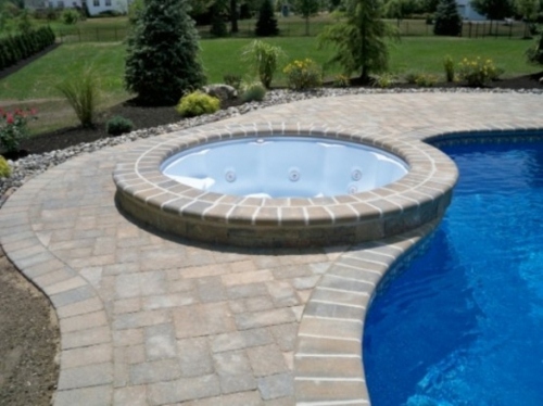 outdoor jacuzzi circular pool edge slab