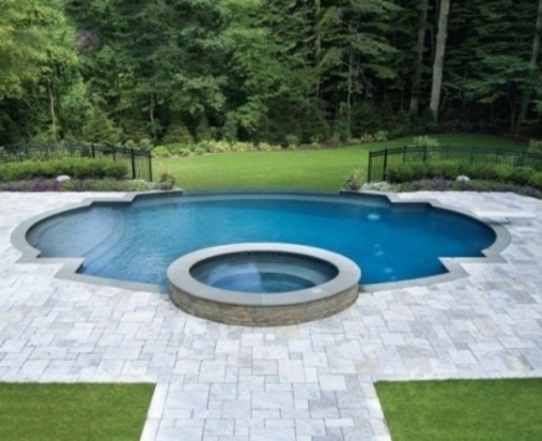 outdoor jacuzzi swimming pool pavement blue water garden