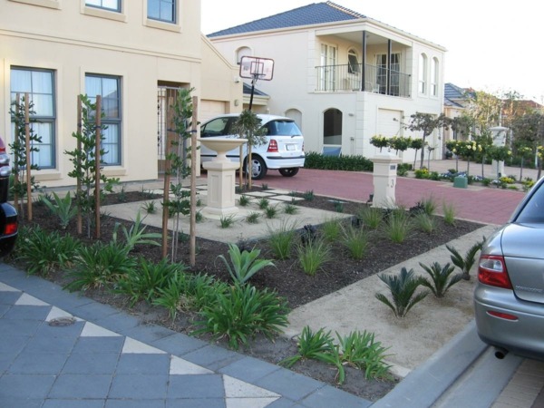 exotic garden in front of house