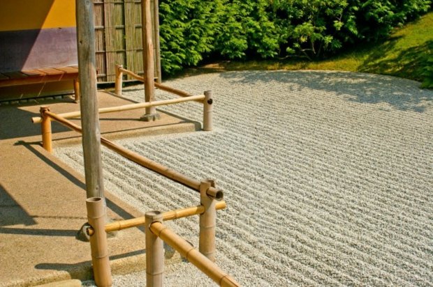 Zen garden with rustic bamboo balustrade