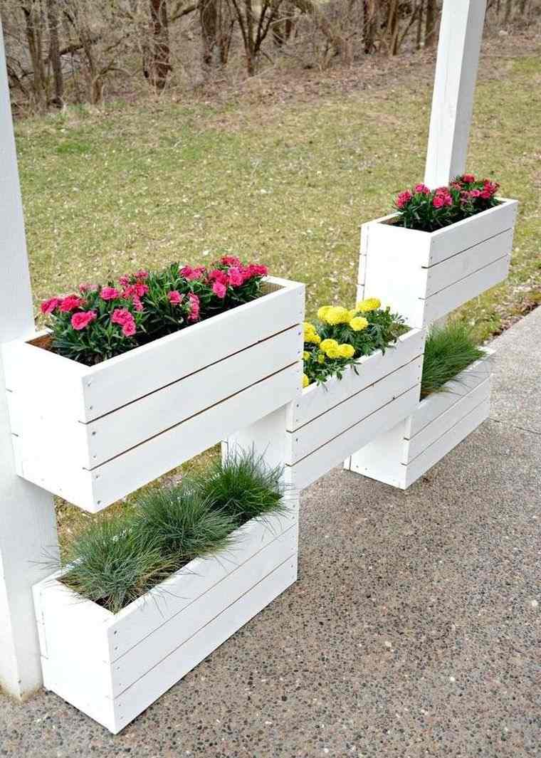 jardiniere-in pall-of-wood-railing patio-veranda