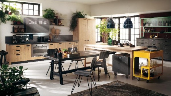 wide kitchen with bright living room