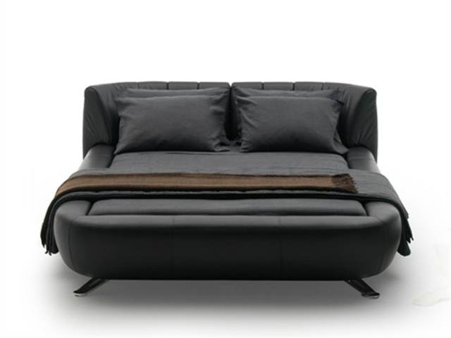 dark brown leather bed