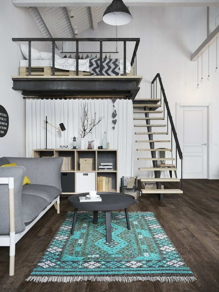 modern loft arrangemang idé golv matta blå trä trappa soffbord svart soffa grå kuddar