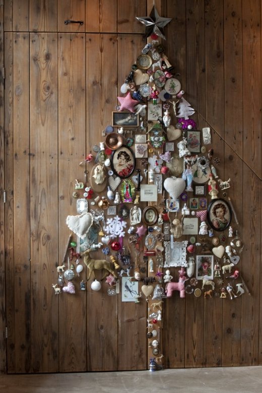 beautiful fir tree with accessories on the wall