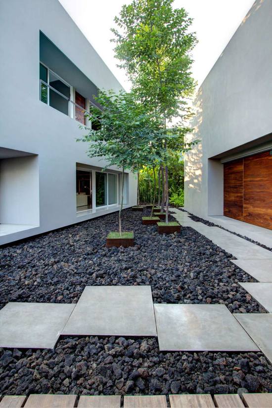 contemporary house outside space pebbles