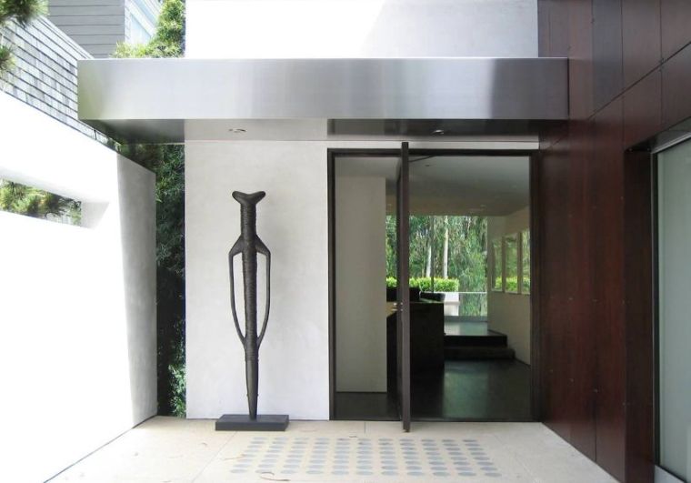 house architect statue door entry