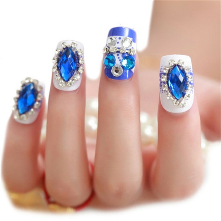white wedding manicure blue sparkle gemstones