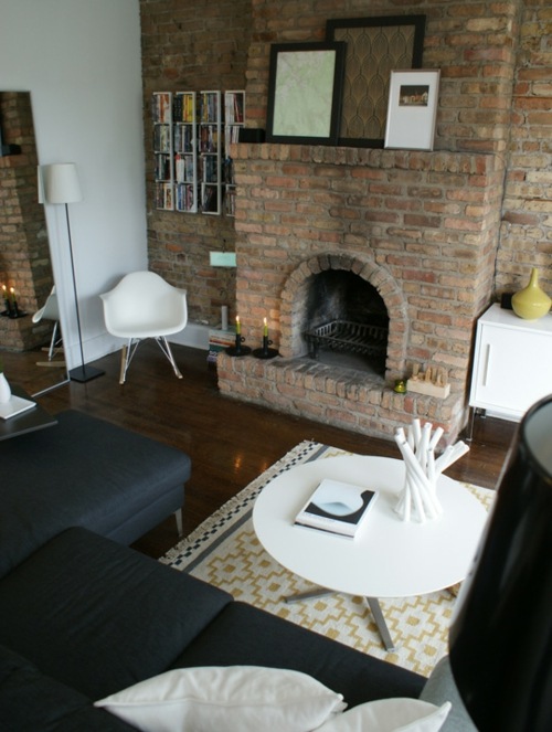 black furniture wood floor view fireplace