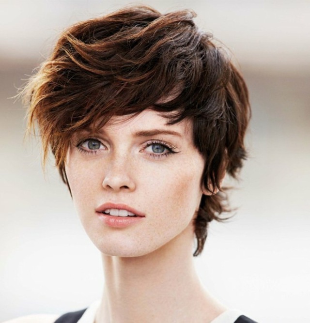 mid-length haircut woman blue eyes