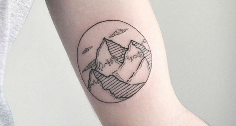 mountain-tattoo-arm-woman-delicate