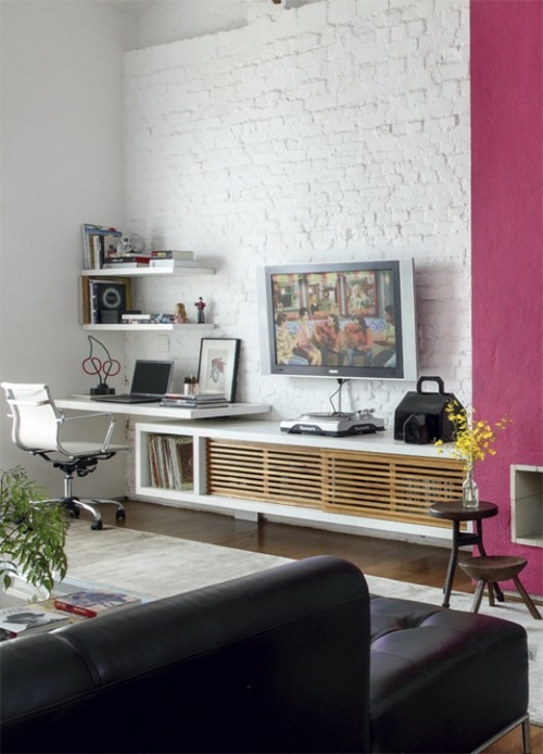 white painted brick wall living room dresser