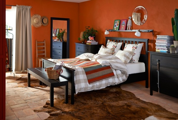 orange walls dark furniture bedroom