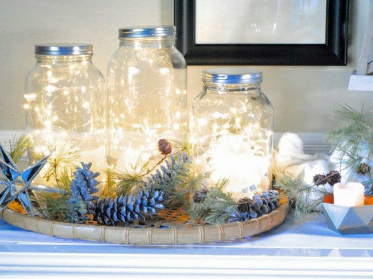 decoration idea candle holders glass pine cones light garlands