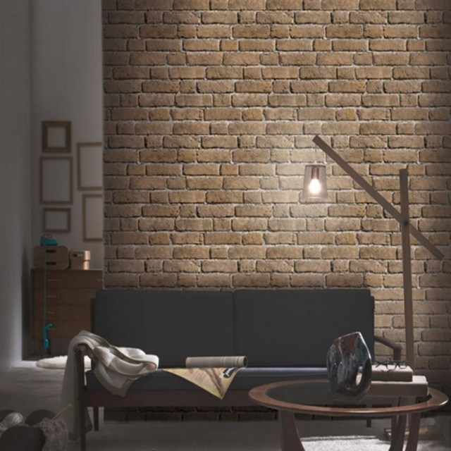 living room idea wall brick black sofa