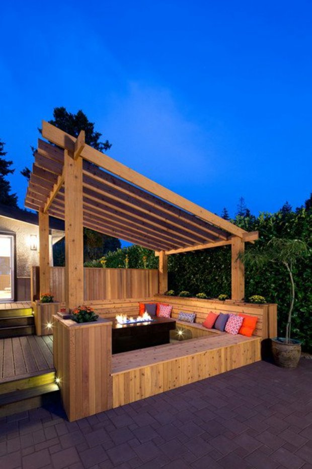 contemporary wood patio with a brazier