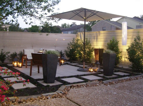 paved patio with umbrella