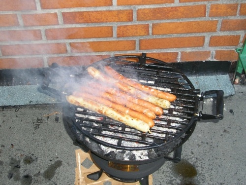 small round wood barbecue