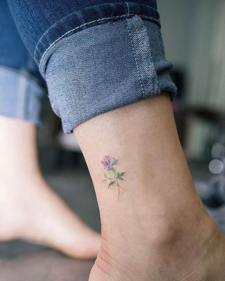 small-tattoo-woman-arm-tattoo-design