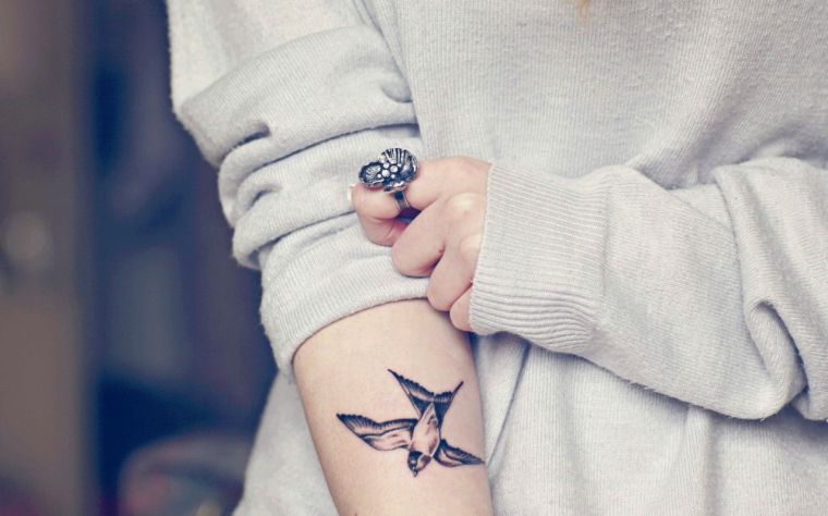 Breakfast-swallow-tattoo-pictures-meaning woman