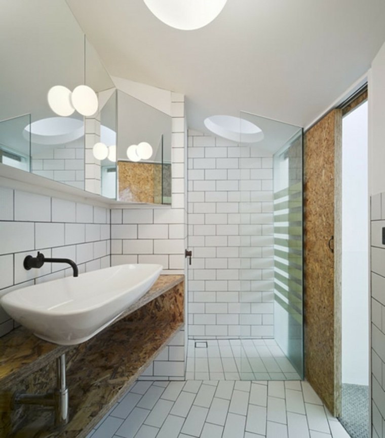 small bathroom with round velux