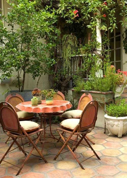 small round table terrace greenery