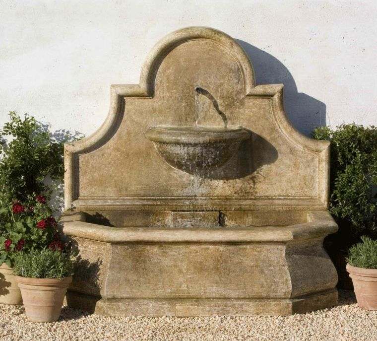 outdoor stone wall fountain idea