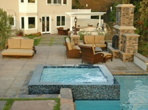 tiled pool outdoor tub fireplace fireplace