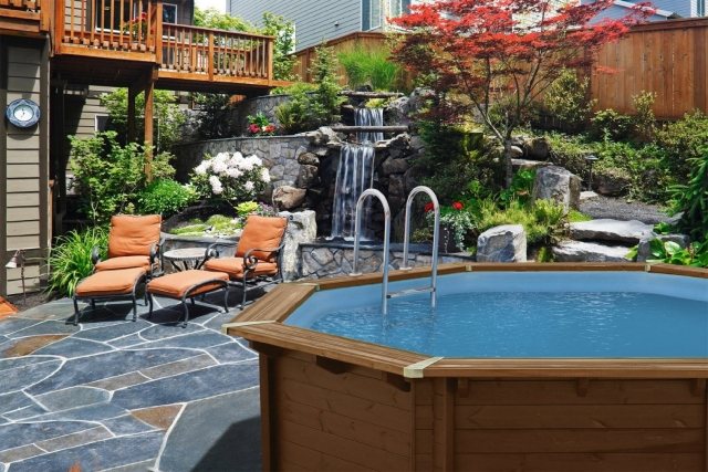 aboveground pool-wood slabs garden-plant-waterfall