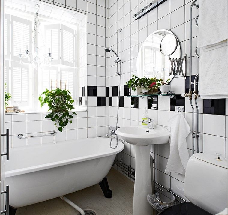 bathroom design idea tub tile black white mirror plant deco