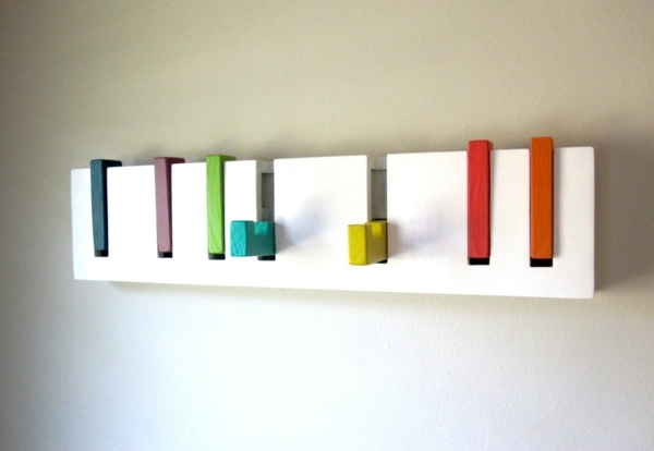 wall-mounted coat rack with retractable hooks