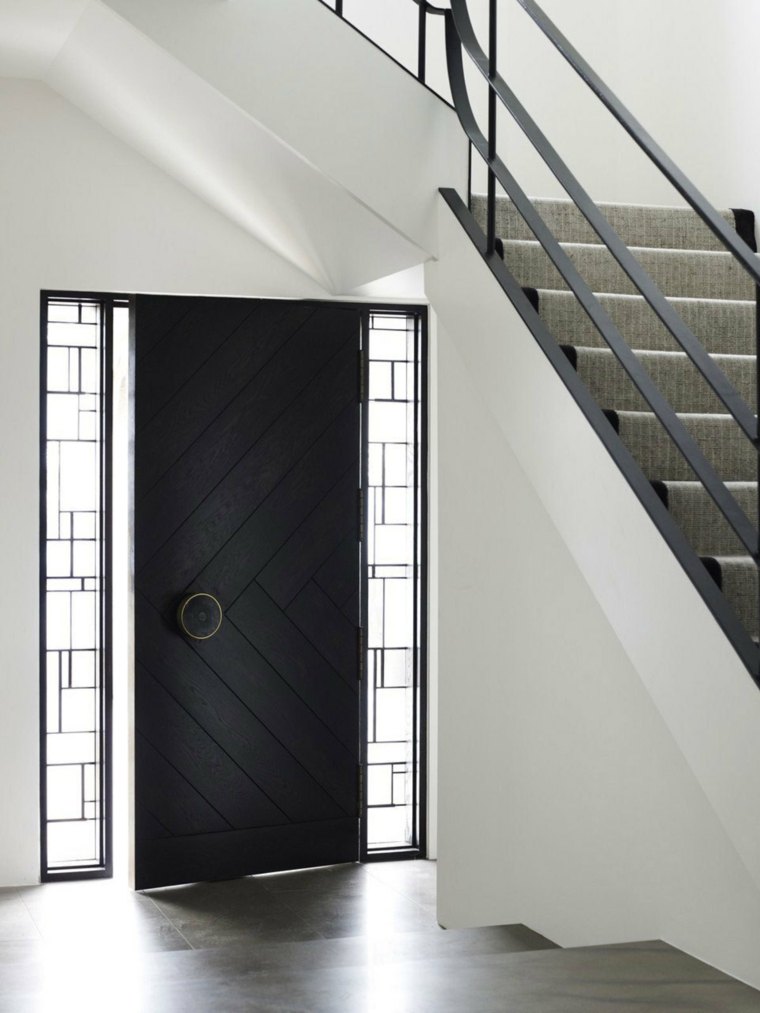 设计d'intérieur moderne porte entrée bois noir design escalier 