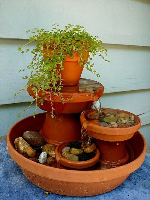 pot flower plant stacks fountain balcony terracotta