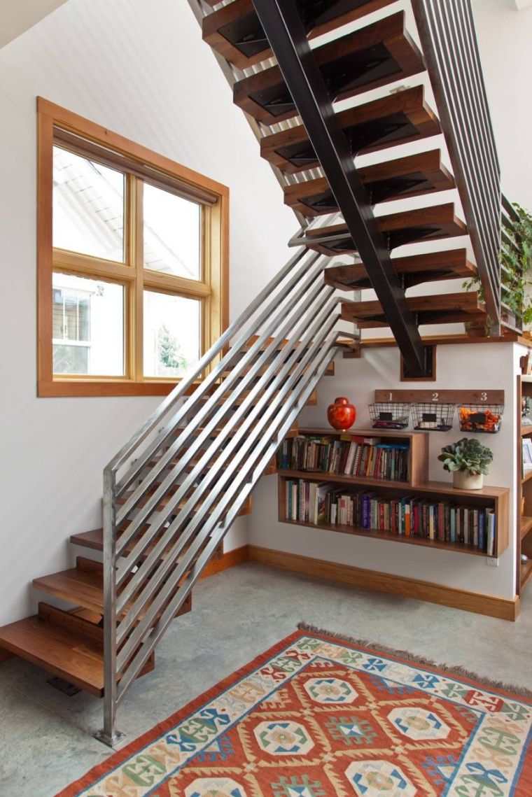 storage under staircase wall wood shelf small stair railing metal