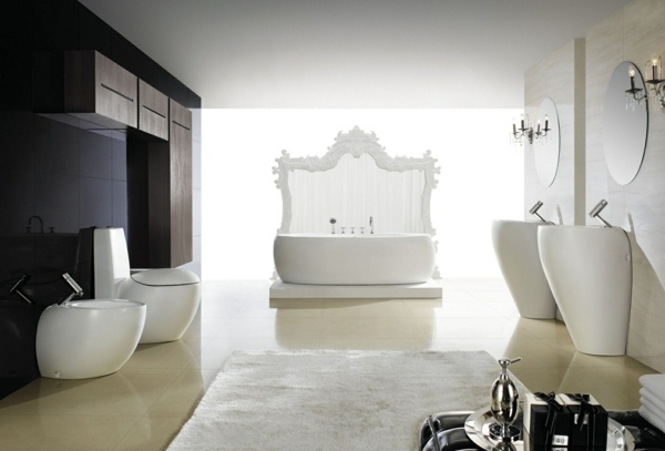 luxurious bathroom with two pedestal washbasins