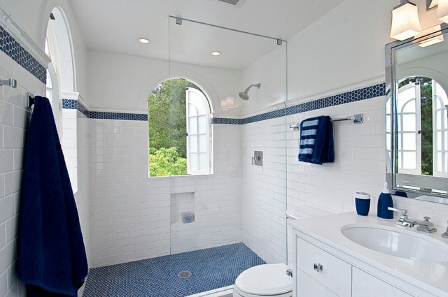 bathroom white blue window shower tiling