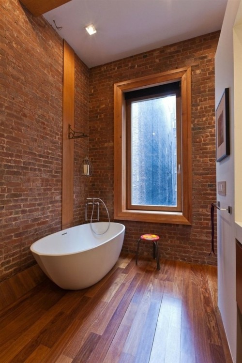 red brick bathroom completely built