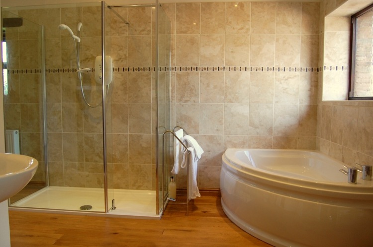 bathroom with italian shower round bathtub