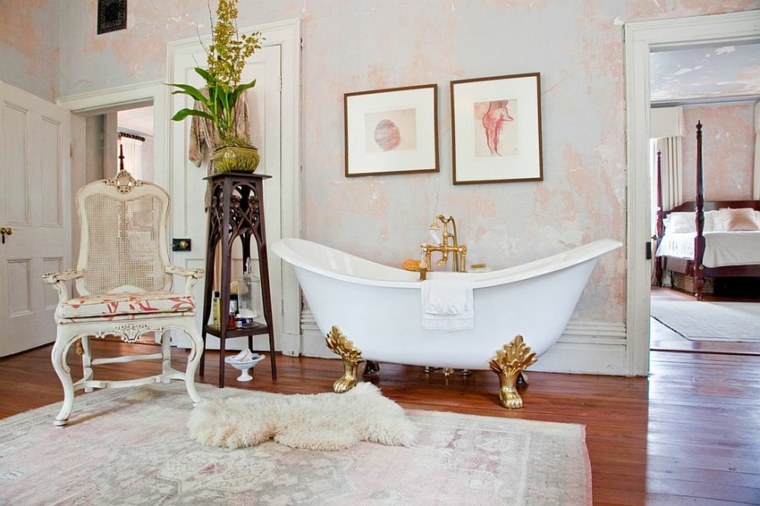 luxury bathroom design idea armchair deco flowers bathtub modern frames wall