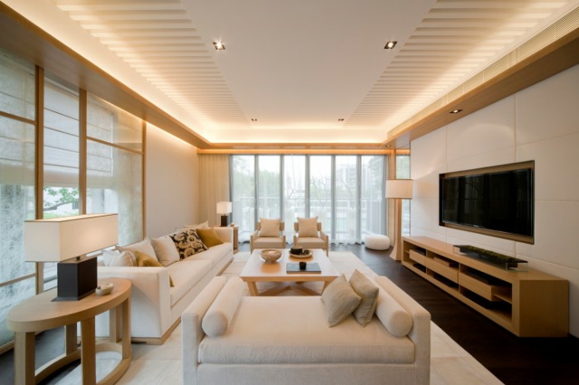 Spacious light beige living room in light tones