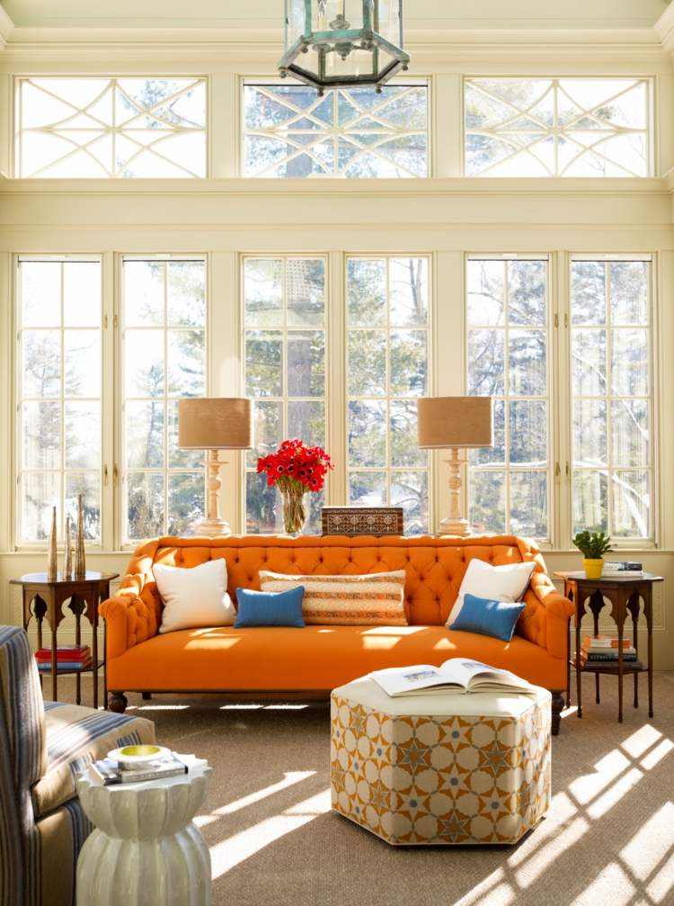 orange sofa pouf cushions lighting fixture