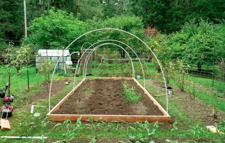 do garden greenhouse wood frame and bows